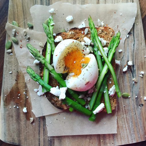 Hummus on Toasted Rye With Pomegranate Seeds, Radish & Cress